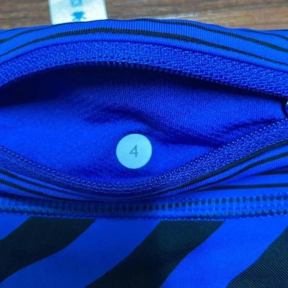 LIKE NEW! Lululemon Run: Inspire Crop II in blue, size 4 - Picture 10 of 10